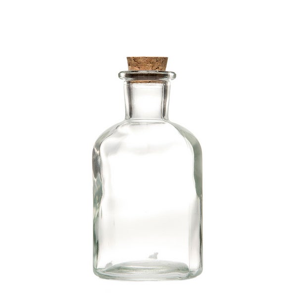 Lasipullo korkilla, eri kokoja