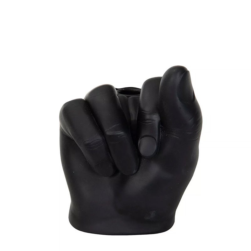 Kynttil&auml;njalka, musta nyrkki